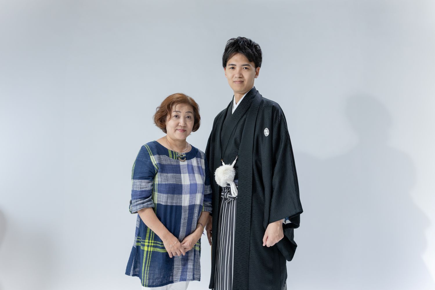 紋服姿の新郎とお母様